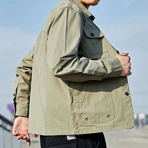 Men's khaki green cargo shirt jacket with functional flap pockets and cotton twill fabric