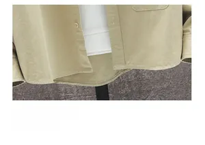 Close-up of the stylish swallowtail hem on this casual khaki long-sleeve shirt