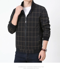 Close-up of men's reversible stand collar jacket with fine grid pattern and zipper detail
