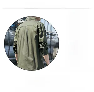 Detail view of military green long-sleeve men's slim fit shirt with back pleat design