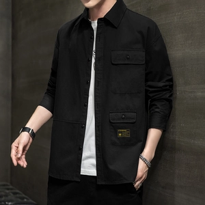 Men's loose fit black utility shirt with long sleeves and dual chest pockets