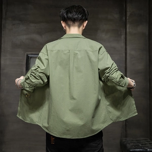 Men's olive green workwear shirt featuring a classic lapel and durable cotton fabric