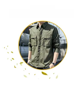 Detail of army green cargo shirt showing dense fabric texture and double chest pockets