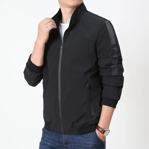 Men's casual black zip-up jacket with stand collar and 'FREE' text detail on sleeve