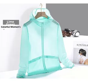 Detail of lime green lightweight sun protection jacket with hood and zippered side pockets