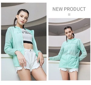 Detail of light green hooded sun protection jacket with breathable translucent fabric