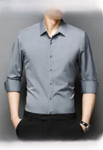Detailed close-up of slim fit charcoal grey business shirt with fine fabric texture