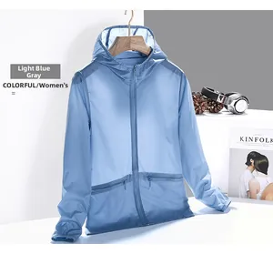 Detail of light blue sun protection jacket with hood, zipper and side pockets