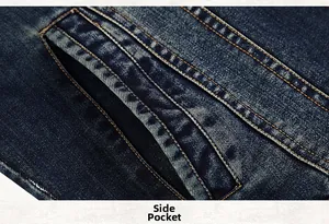 Detail of classic blue denim jacket featuring side pockets and contrast yellow stitching