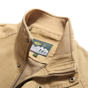 Men's khaki stand collar casual jacket with textured cotton twill fabric and metal zipper