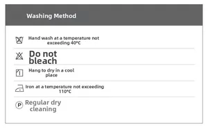 Care label showing 40°C hand wash, no bleach, and low temperature ironing instructions