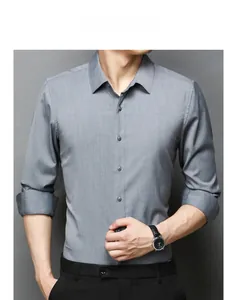 Detailed close-up of slim-fit grey men shirt showing twill texture and collar