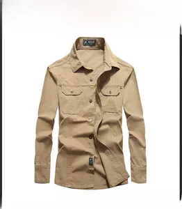 Detailed front view of khaki cotton outdoor shirt with lapel and symmetrical chest pockets