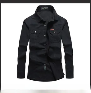 Detailed front view of black outdoor cotton shirt with dual chest pockets and lapel collar