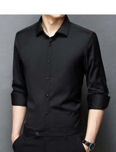 Detailed view of men's slim fit black long sleeve dress shirt with buttoned collar
