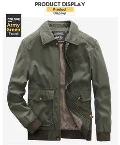 Detail of army green cotton jacket featuring vintage embroidery and large utility pockets