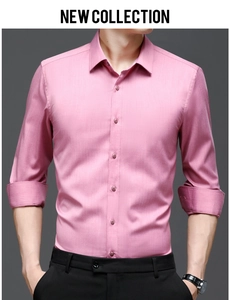 Detail of slim-fit men's long sleeve business shirt in light pink-purple with cuffed sleeves