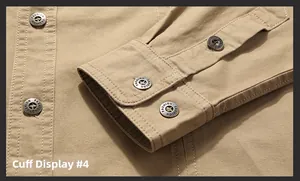 Detail of khaki cotton shirt cuff with double buttons and fine twill fabric texture