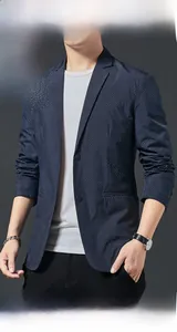 Detail of slim fit navy blue jacket with white micro polka dots for men's casual wear