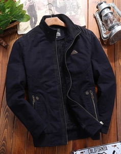Close-up of windproof jacket with warm fleece lining and diamond quilting detail