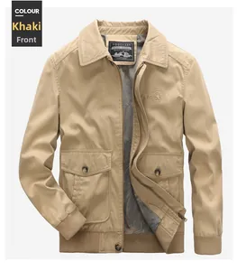Detail view of khaki military jacket featuring utility pockets and metal zipper closure