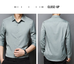 Detailed view of light gray slim fit men's dress shirt fabric and classic buttoned cuffs