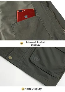 Detail of cargo jacket showing inner phone pocket and metal button with logo embroidery