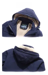 Detail view of men's navy blue windbreaker featuring warm cream fleece lining and detachable hood