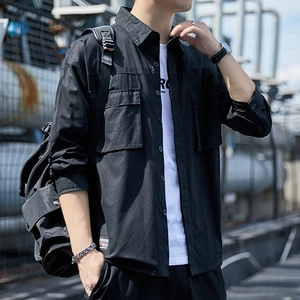Men's outdoor casual long sleeve shirt in black with twin chest pockets and fashion label