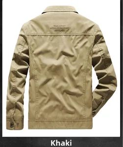 Detail view of khaki cotton jacket back featuring FREE SPIRIT embroidery and metal buttons