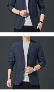 Close-up of men's navy blue blazer featuring white polka dot texture and lapel details