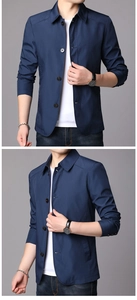 Detail of navy business casual jacket showing fine micro-grid texture and classic collar lapel