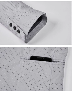 Close-up of gray perforated jacket featuring three sleeve buttons and a functional pocket