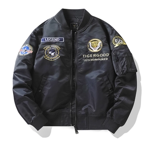 Men's black MA-1 bomber jacket featuring tiger embroidery and military-style badges