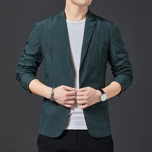 Men's slim fit dark green blazer with white micro polka dots on a grey background