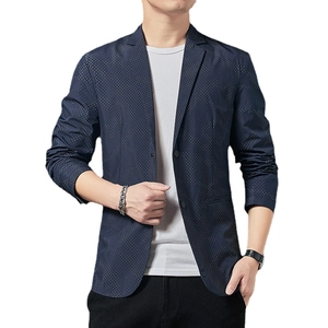 Men's casual slim fit navy blue blazer with white polka dot pattern and notched lapels