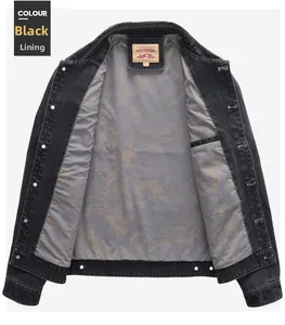 Detail of black denim jacket showing gray landscape print lining and inner pocket