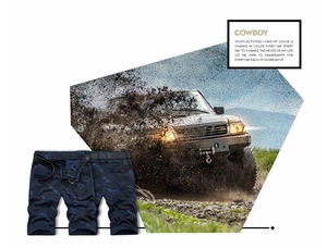 Detail of navy camouflage cargo shorts featuring multi-pockets and a woven black belt