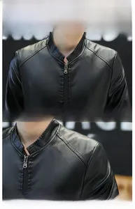 Detail view of the black PU leather jacket standing collar and metal zipper hardware
