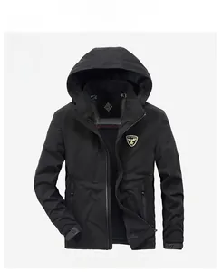 Detail of black hooded jacket featuring a zip-up front and branded chest emblem