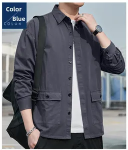 Detail of navy blue work shirt featuring symmetrical flap pockets and high-quality cotton