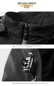 Detail of metal zipper with Fashion print and adjustable hood drawstring on black jacket