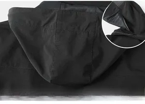 Detail of the hooded design with 3D tailoring on the casual black zipper jacket