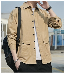 Close-up of khaki utility shirt with flap pockets and premium cotton twill texture