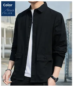 Detail of a black cotton long-sleeve casual utility shirt with chest pockets
