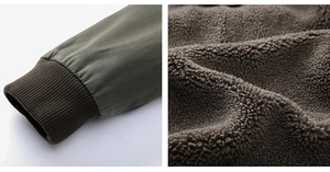 Detail of ribbed cuffs and thick faux shearling lining on warm winter jacket