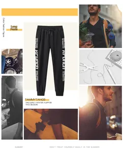 Détail du jogging noir avec cordon de serrage et imprimé graphique Krunch blanc