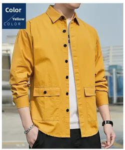 Close-up of yellow casual work shirt featuring functional chest pockets and black buttons