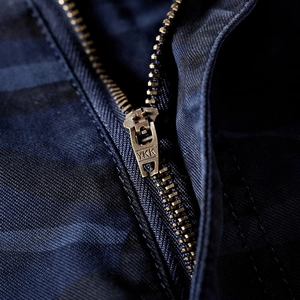 Deep blue camouflage shorts featuring a high-quality metallic YKK zipper detail and fabric