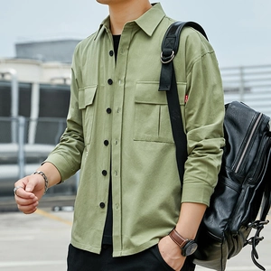 Men's sage green cotton utility shirt with long sleeves and dual flap pockets for spring